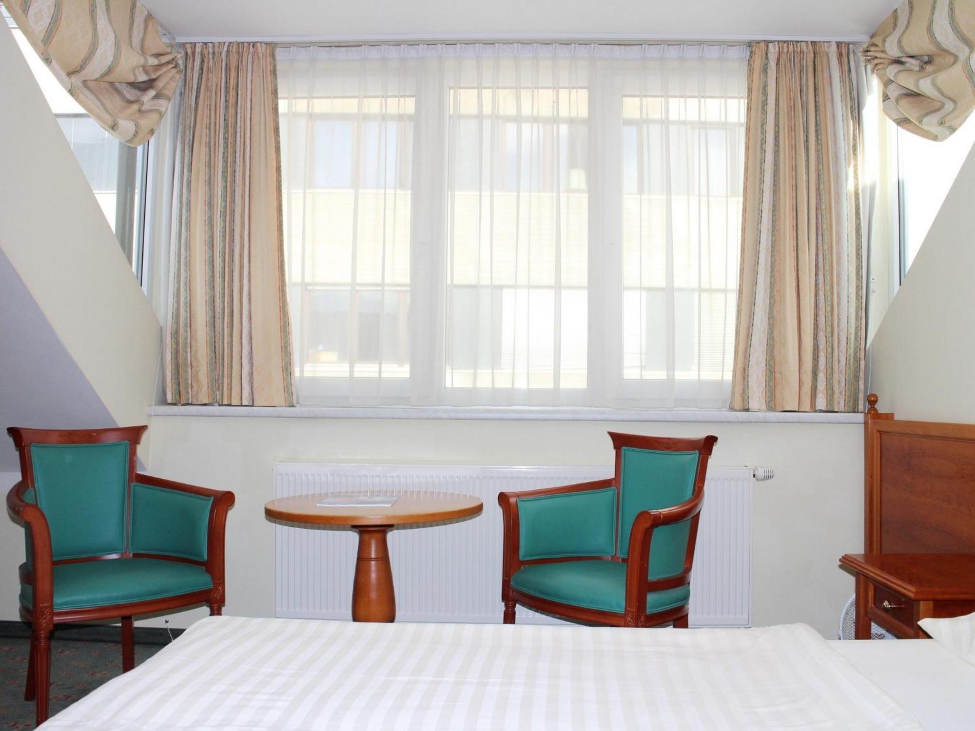 Altstadt Hotel Mosser Villach Habitación foto